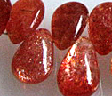 AA Fire Sunstone 5x7 to 7x10mm Smooth Briolette Beads
